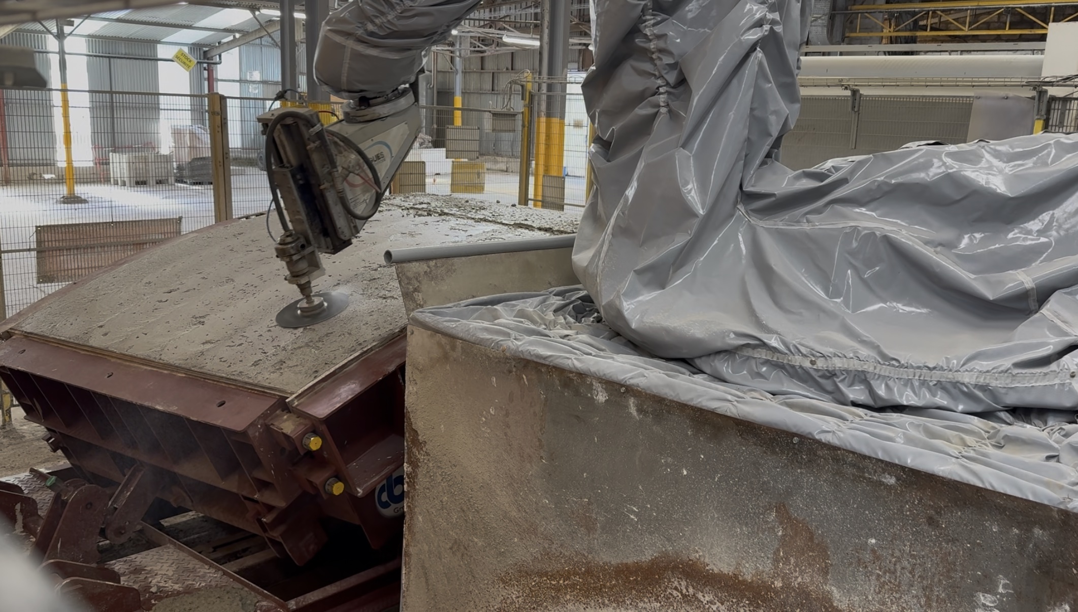 Robot ABB de talochage de béton illustrant un projet réalisé pour EQUANS et STRADAL